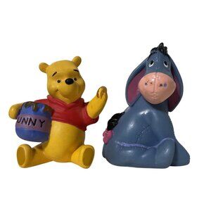 Vintage PVC figurines of Winnie the Pooh and Eeyore